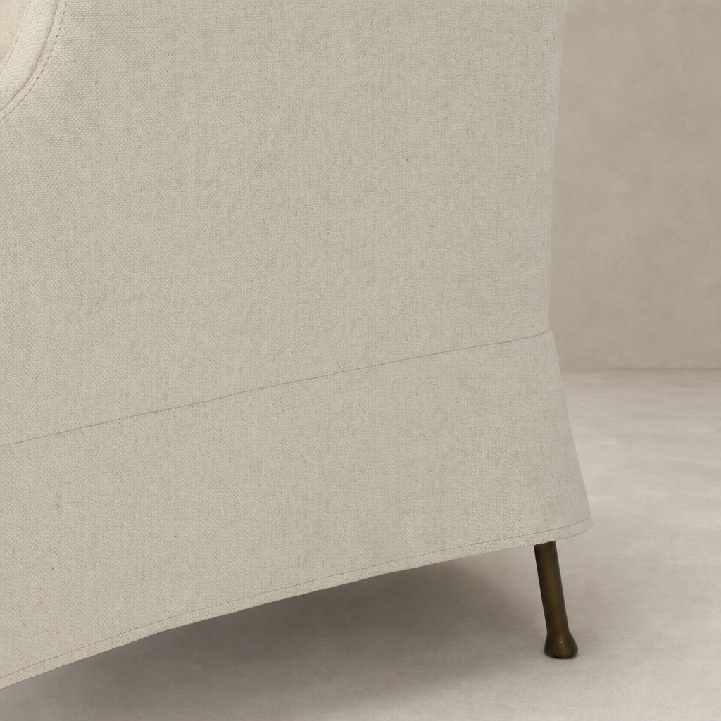 Ada Chair in Bergamo Parchment showcasing soft fabric texture and elegant leg design.