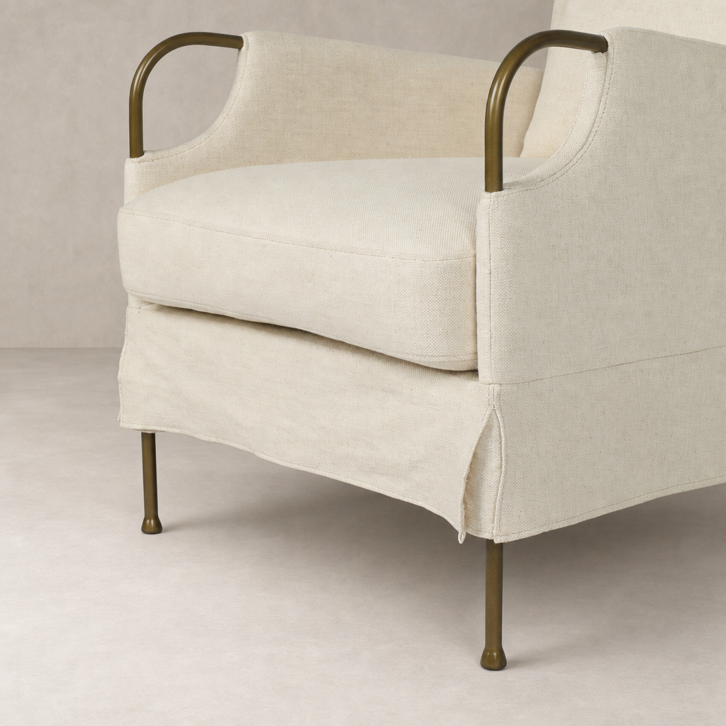Ada Chair in Bergamo Parchment featuring a soft fabric and sleek metal legs.