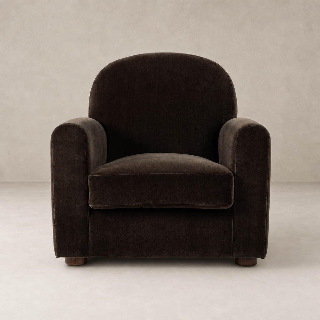 Chiara Chair in Monte Chocolate, featuring rounded arms and plush upholstery.