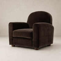 Chiara Chair in Monte Chocolate featuring rounded arms and soft, luxurious upholstery.
