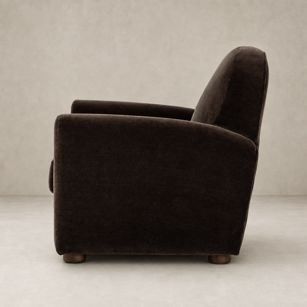 Chiara Chair in Monte Chocolate featuring a plush, curved back and sturdy legs.