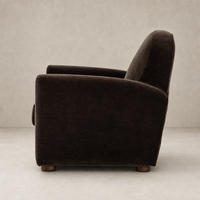 Chiara Chair in Monte Chocolate featuring a plush, curved back and sturdy legs.