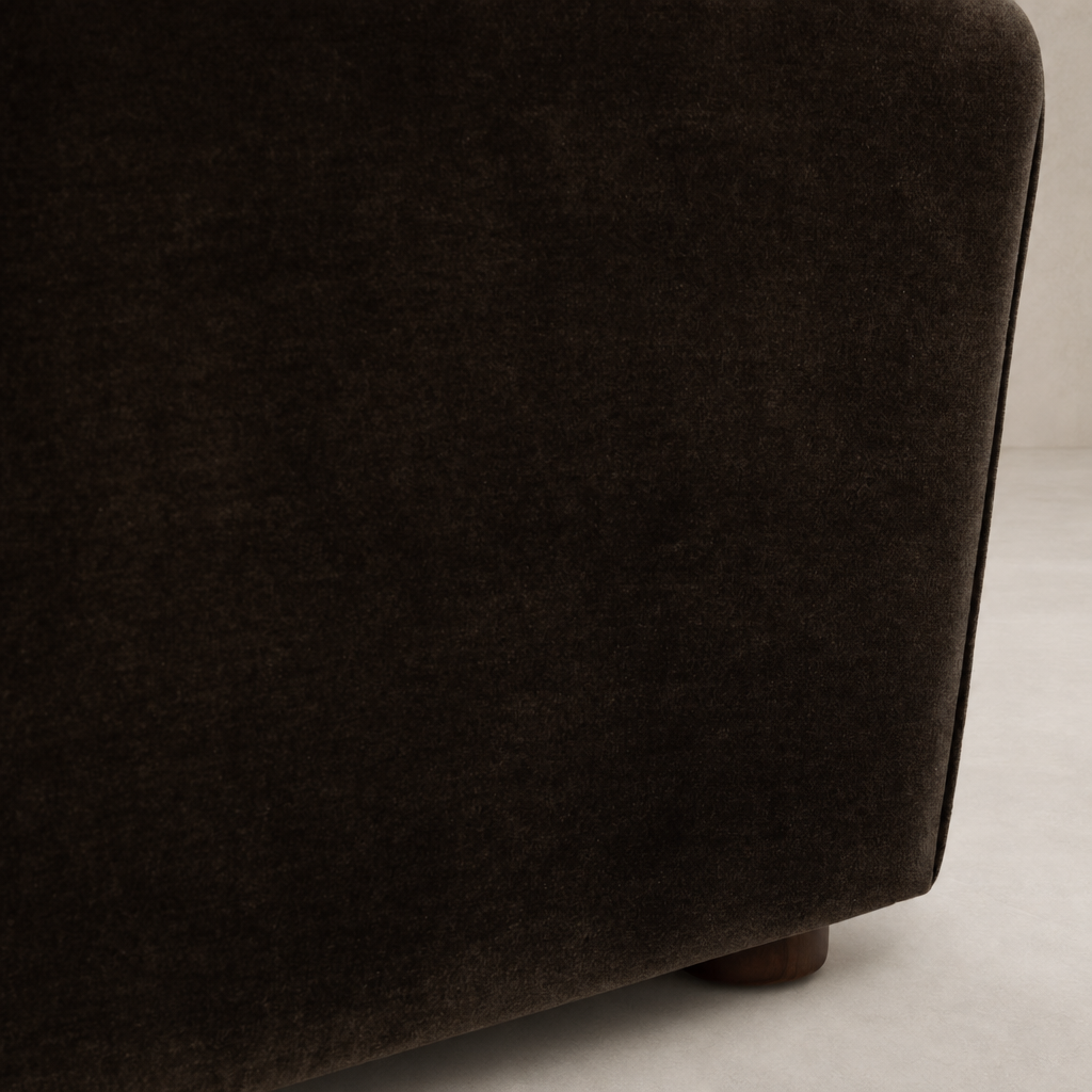 Chiara Chair in Monte Chocolate showing soft, plush velvet texture and rounded edges.