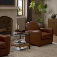 Dulane Mahogany Chiara Chair with rounded back and plush cushioning in stylish living room.