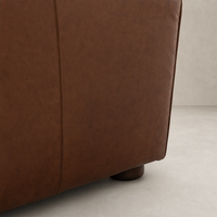 Close-up of the Chiara Chair in Dulane Mahogany showcasing its rich, textured finish.