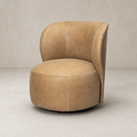 Misha Swivel Chair in Palermo Drift featuring a sleek, rounded design and soft leather finish.