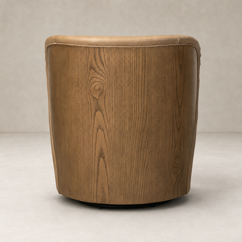 Misha Swivel Chair in Palermo Drift features a stylish curved wooden back with a sleek finish.