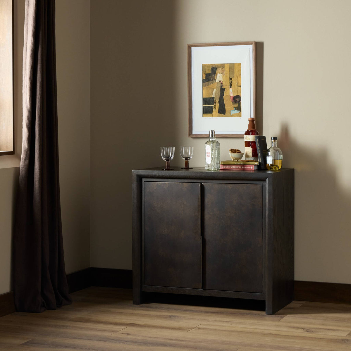 Espresso Oak Lazuli Small Cabinet in stylish room setting with decorative items.