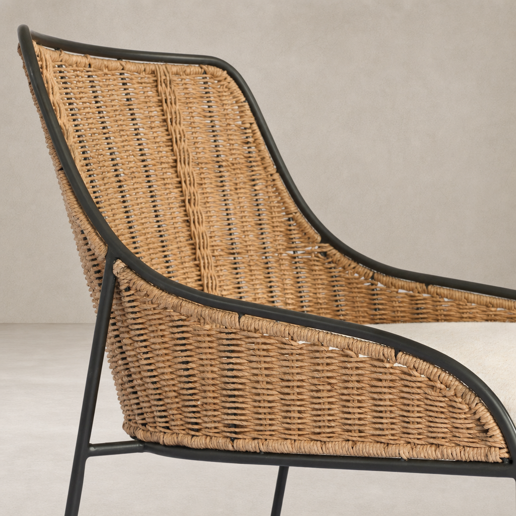Savile Flax dining chair with curved woven seat and sleek black metal frame.