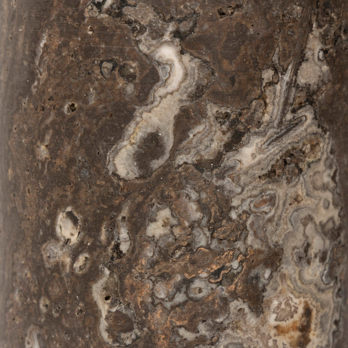 Antique nickel cordless table lamp showcasing intricate marbled texture design.