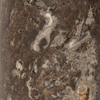 Antique nickel cordless table lamp showcasing intricate marbled texture design.