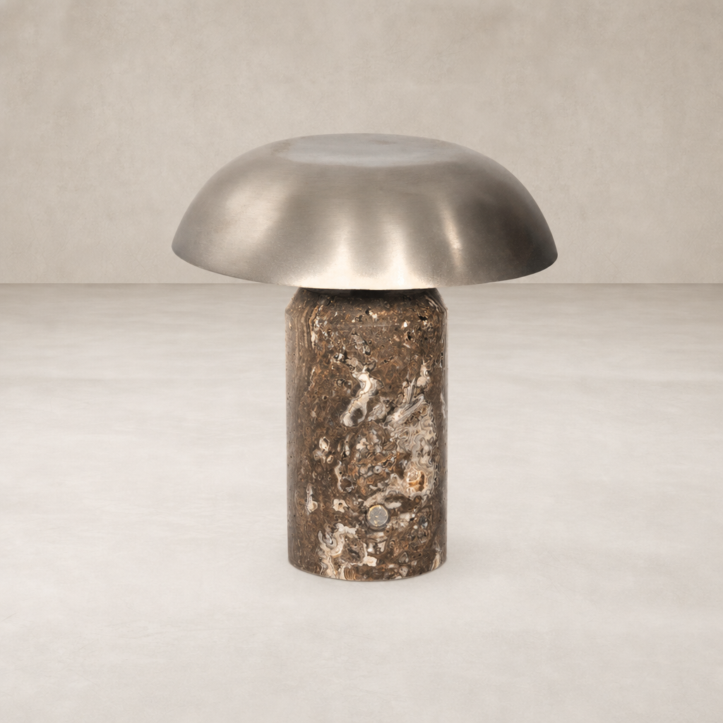 Cordless table lamp with antique nickel shade and textured base design.