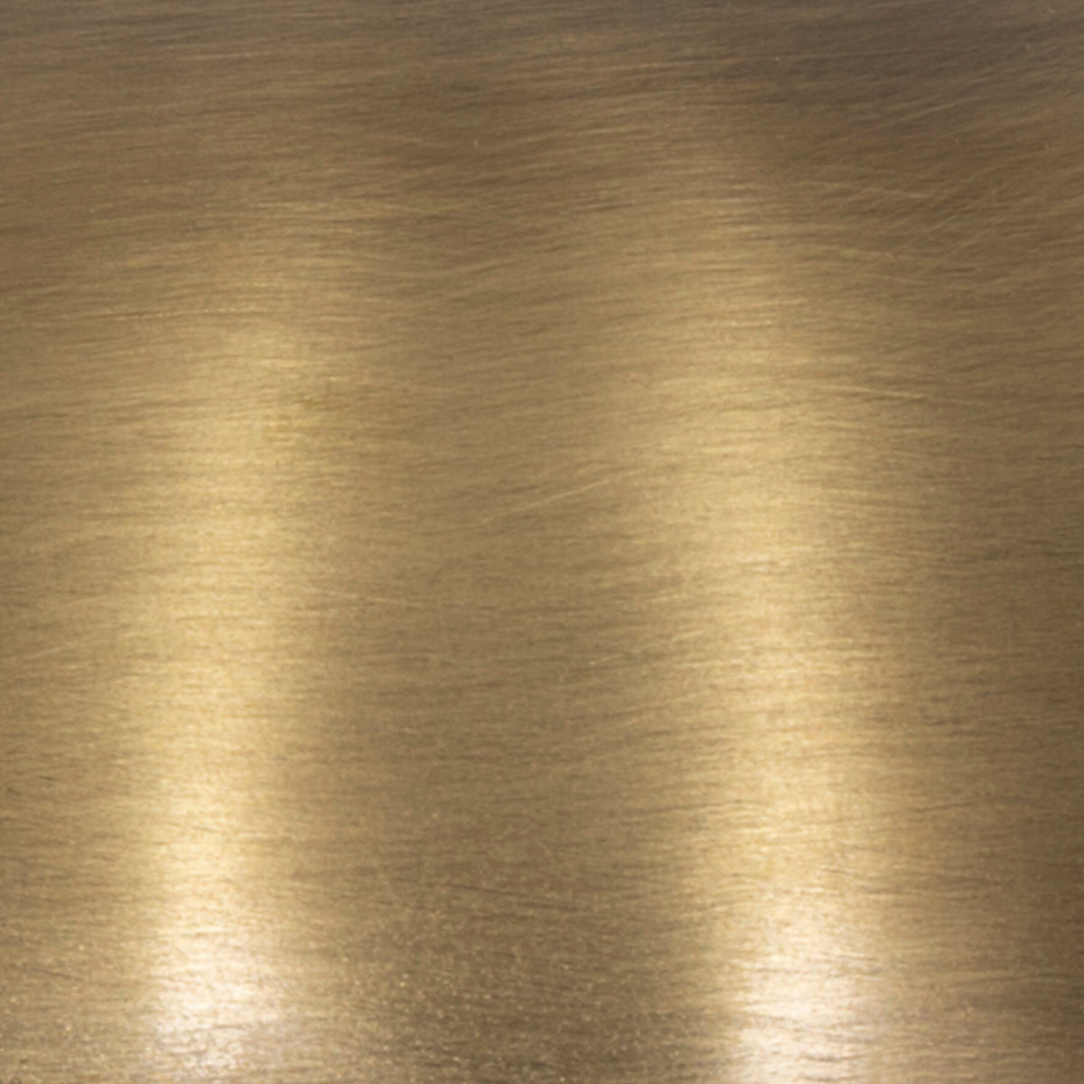 Detailed close-up of aged antique brass iron surface on a cordless table lamp.