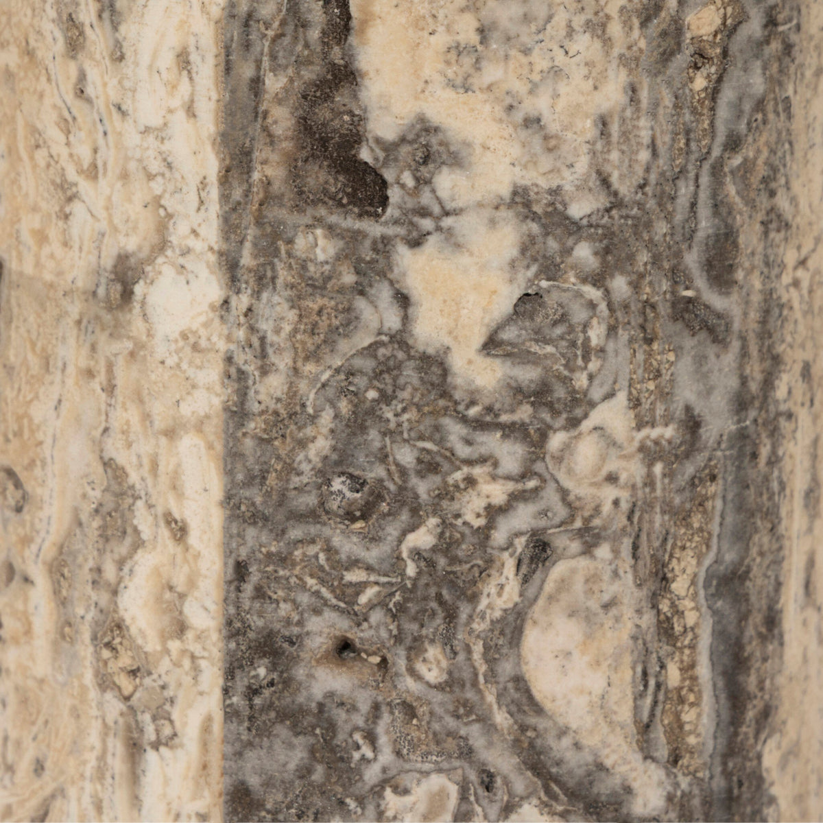 Close-up of aged antique brass iron texture with intricate patterns and neutral tones.