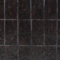 Textured brown tile surface ideal for a stylish end table design.