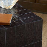 Textured brown tile end table showcasing a sleek, modern design with a glossy finish.
