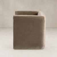 Surrey Fossil accent stool with a sleek, modern design and soft velvet texture.