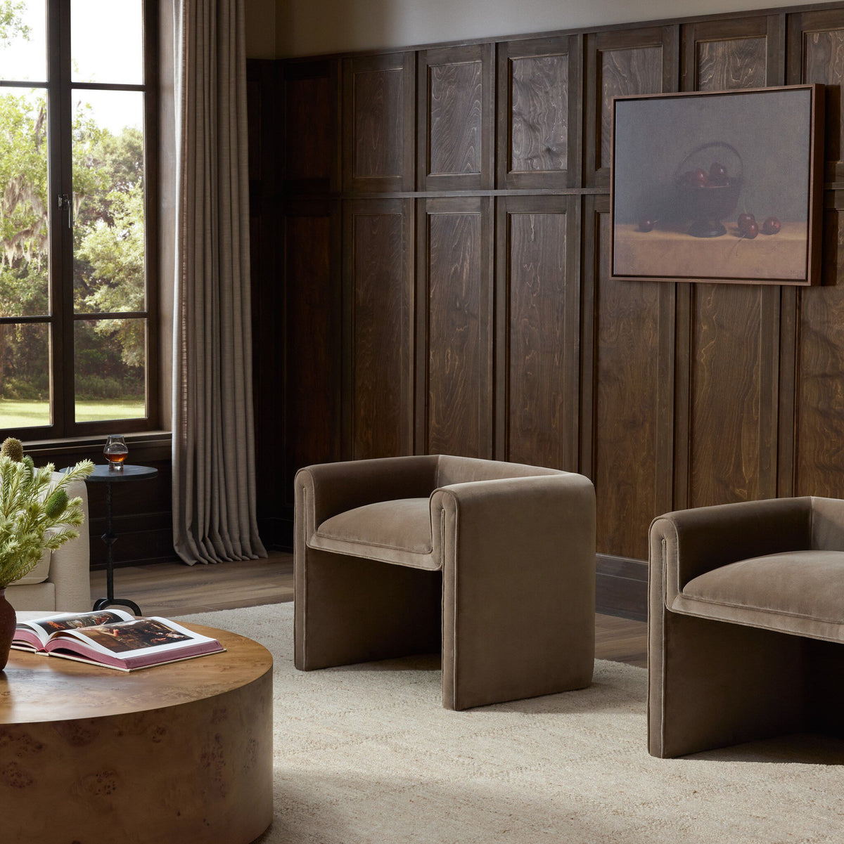 Surrey Fossil accent stool with smooth upholstery in a cozy room setting.