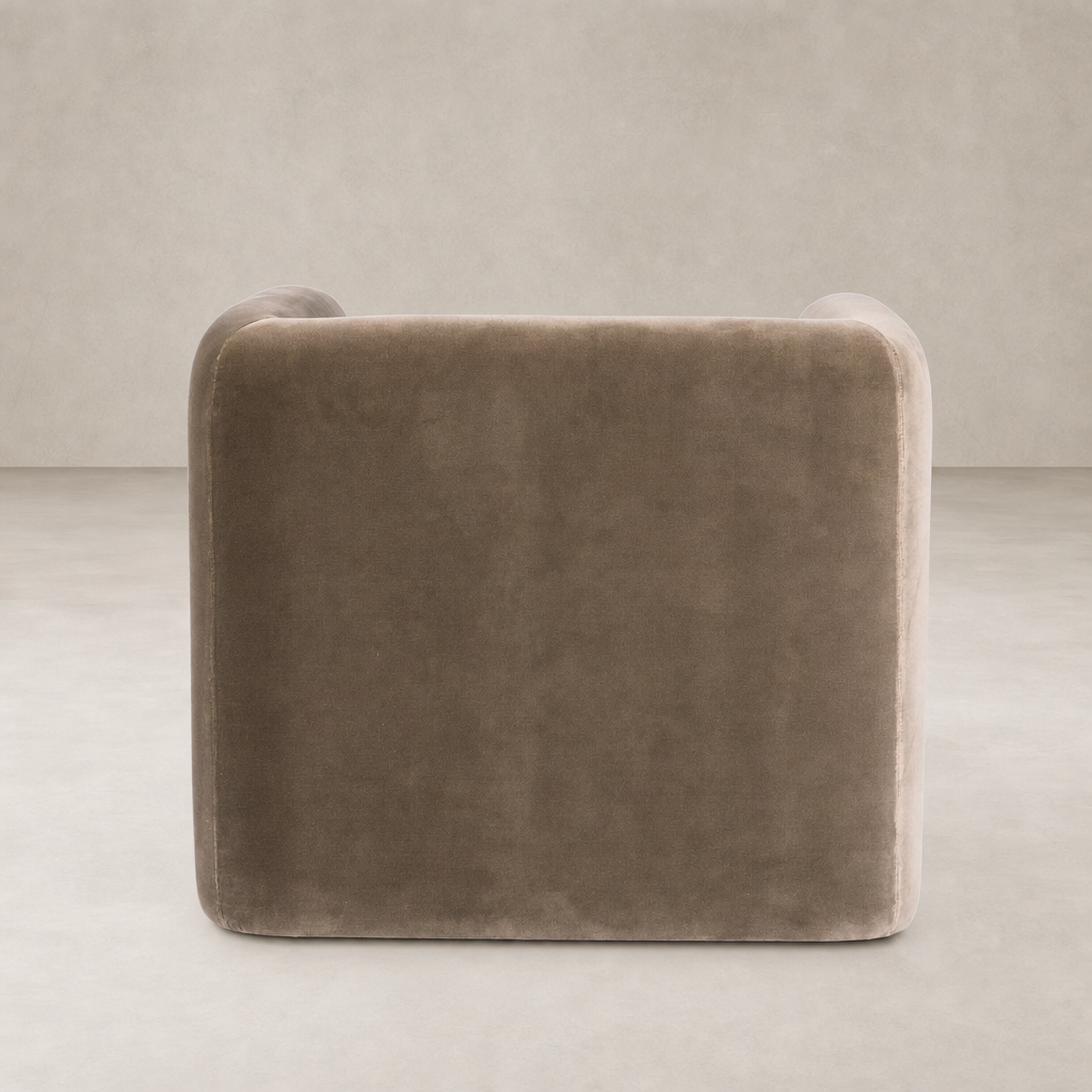 Surrey Fossil accent stool with a smooth, rounded design and plush upholstery.