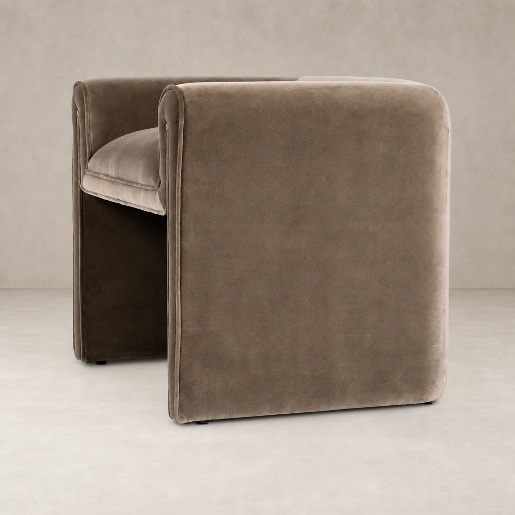 Surrey Fossil accent stool featuring plush upholstery and modern, rounded edges.