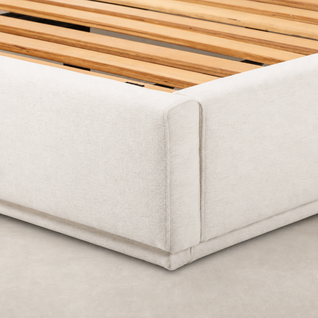 Modern bed frame in Laughlin Bone with clean lines and wooden slats.