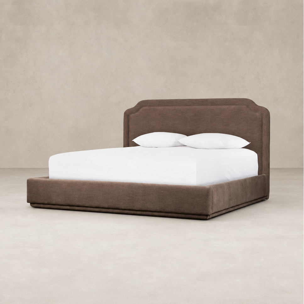 Elegant bed in Laughlin Cafe color with a stylish upholstered headboard.