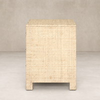 Natural Fleck Raffia nightstand with textured finish and minimalistic design.