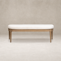 Elegant accent bench in Crypton Nomad Snow with tapered wooden legs.