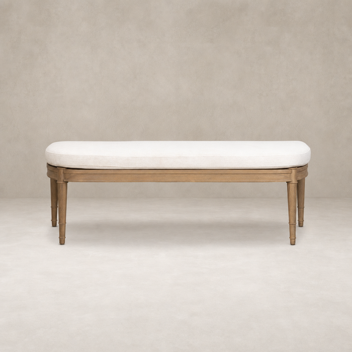 Elegant accent bench in Crypton Nomad Snow with tapered wooden legs.