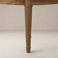 Detail of a wooden leg of a firefinch fawn accent bench with a smooth finish.