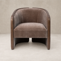 Monte Mushroom accent chair featuring soft fabric and sleek wooden sides.