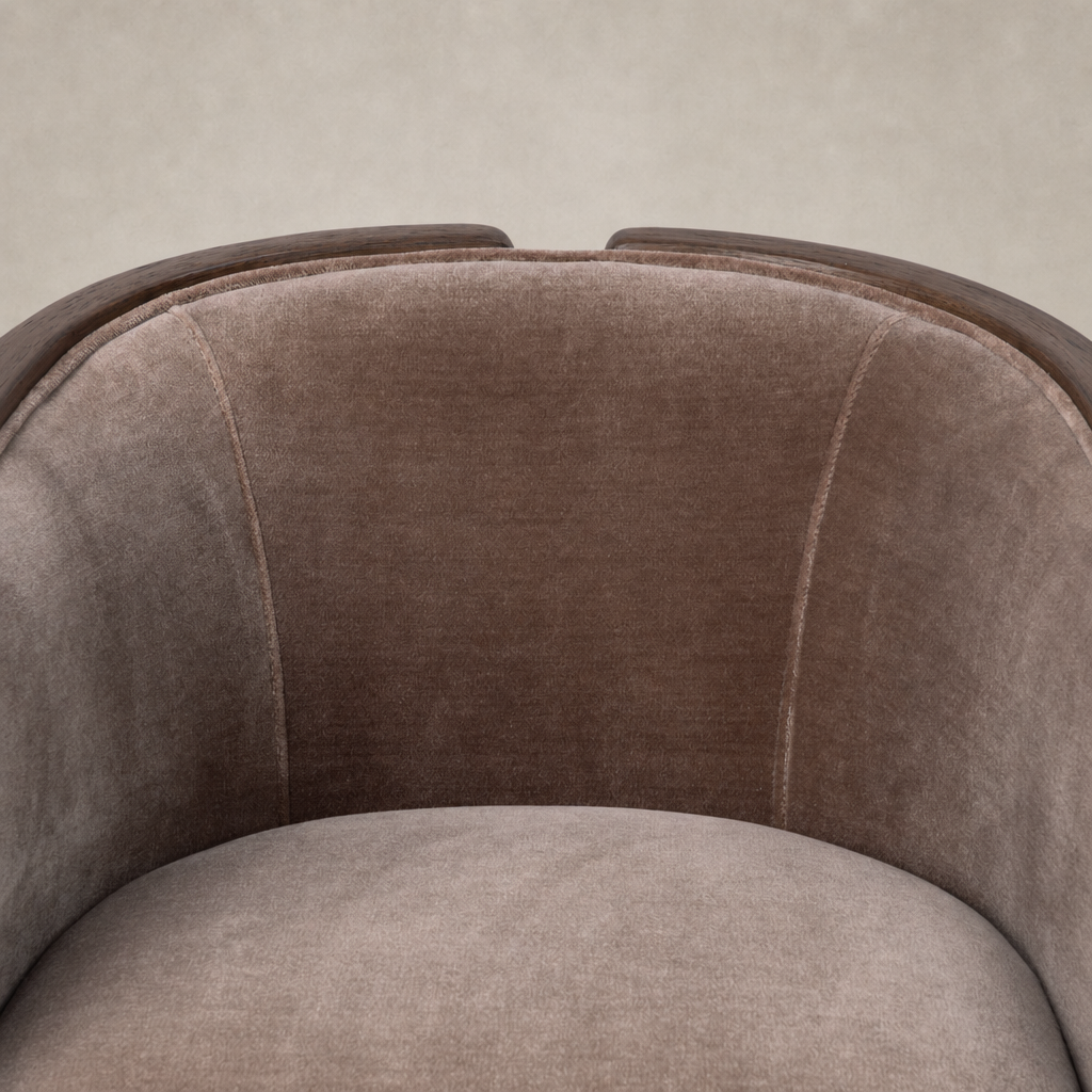 Monte Mushroom accent chair showing soft, plush fabric and curved wood detailing.
