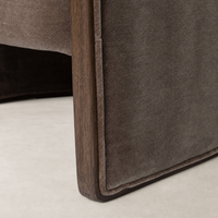Monte Mushroom accent chair showcasing a plush fabric and sleek wooden legs.