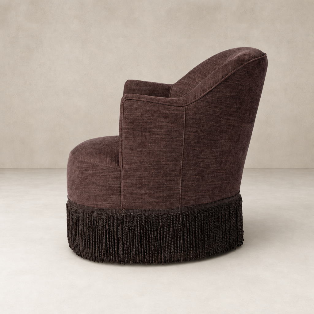 Lyra Fringe Swivel Chair in Laughlin Plum with elegant fringe detailing and curved back.