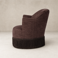 Lyra Fringe Swivel Chair in Laughlin Plum with elegant fringe detailing and curved back.