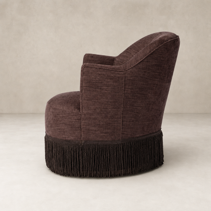 Lyra Fringe Swivel Chair in Laughlin Plum with elegant fringe detailing and curved back.
