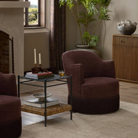 Lyra Fringe Swivel Chair in Laughlin Plum, featuring plush upholstery and stylish fringe detail.