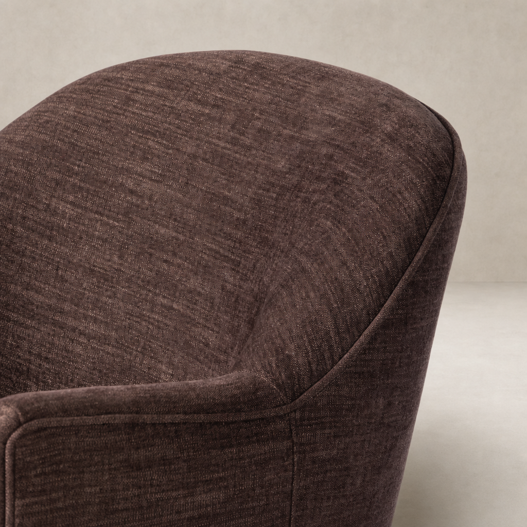 Lyra Fringe Swivel Chair in Laughlin Plum featuring soft, textured upholstery and rounded shape.