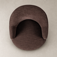 Lyra Fringe Swivel Chair in Laughlin Plum featuring a plush, curved design and textured fabric.