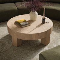 Bergen Round Coffee Table in whitewash rustic wormwood oak with a smooth, rounded top.