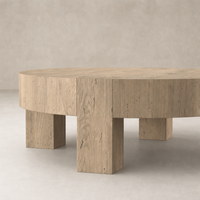 Bergen Round Coffee Table in whitewash rustic wormwood oak with a clean, modern design.
