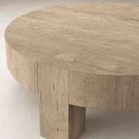 Bergen Round Coffee Table in whitewash rustic wormwood oak with a smooth, minimalist design.