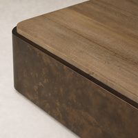Nash Square Coffee Table features a burnt bleached oak top with a textured metal base.