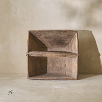 Front view of a vintage 19th-century rice bucket, showcasing its rustic wooden construction and unique shape.