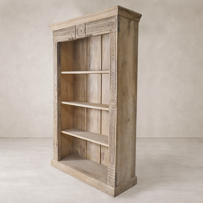 Three-quarter view of the Beirut Vintage Architecture Bookshelf, showcasing intricate carvings and a rustic finish.