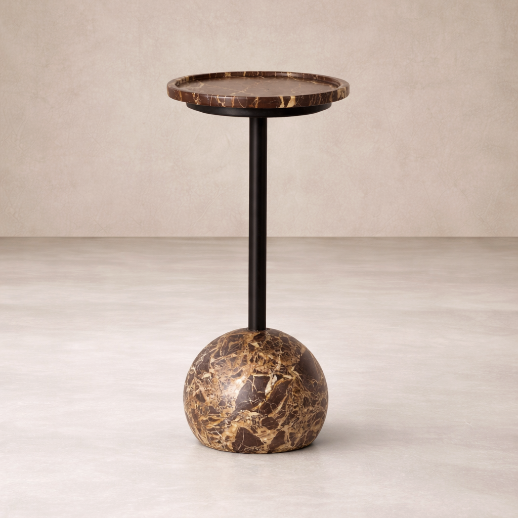 Front view of the Wren Accent Table featuring a round marble top and a sculptural base.