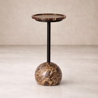 Front view of the Wren Accent Table featuring a round marble top and a sculptural base.