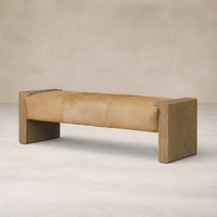 Close-up of the Vale Accent Bench showcasing its soft leather seat and rustic wooden base.