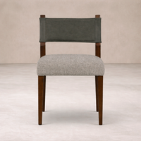 Front view of the Roseto Dining Chair featuring a sleek design with a textured seat and dark wood legs.