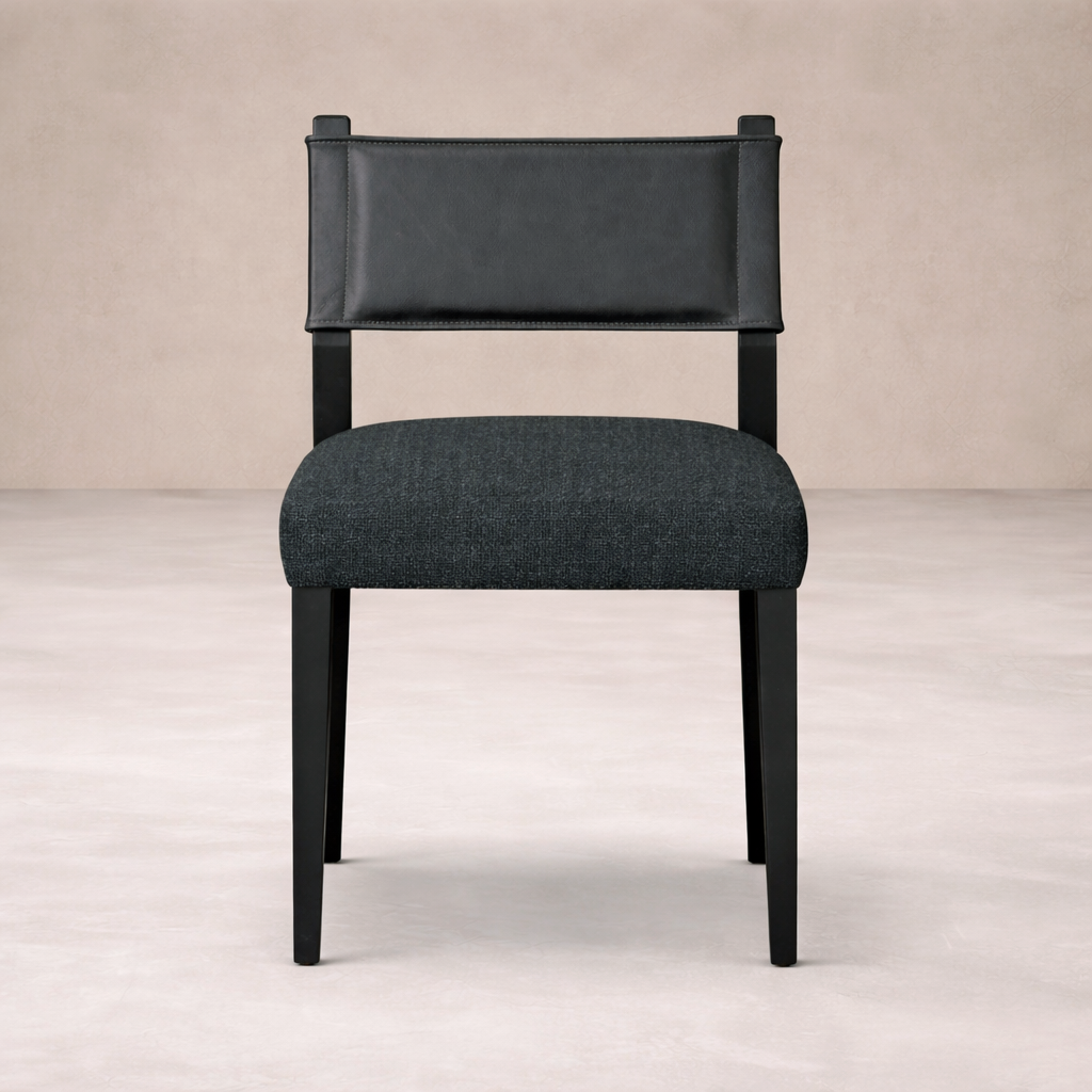 Front view of the Roseto Dining Chair featuring a sleek black frame and textured upholstery.